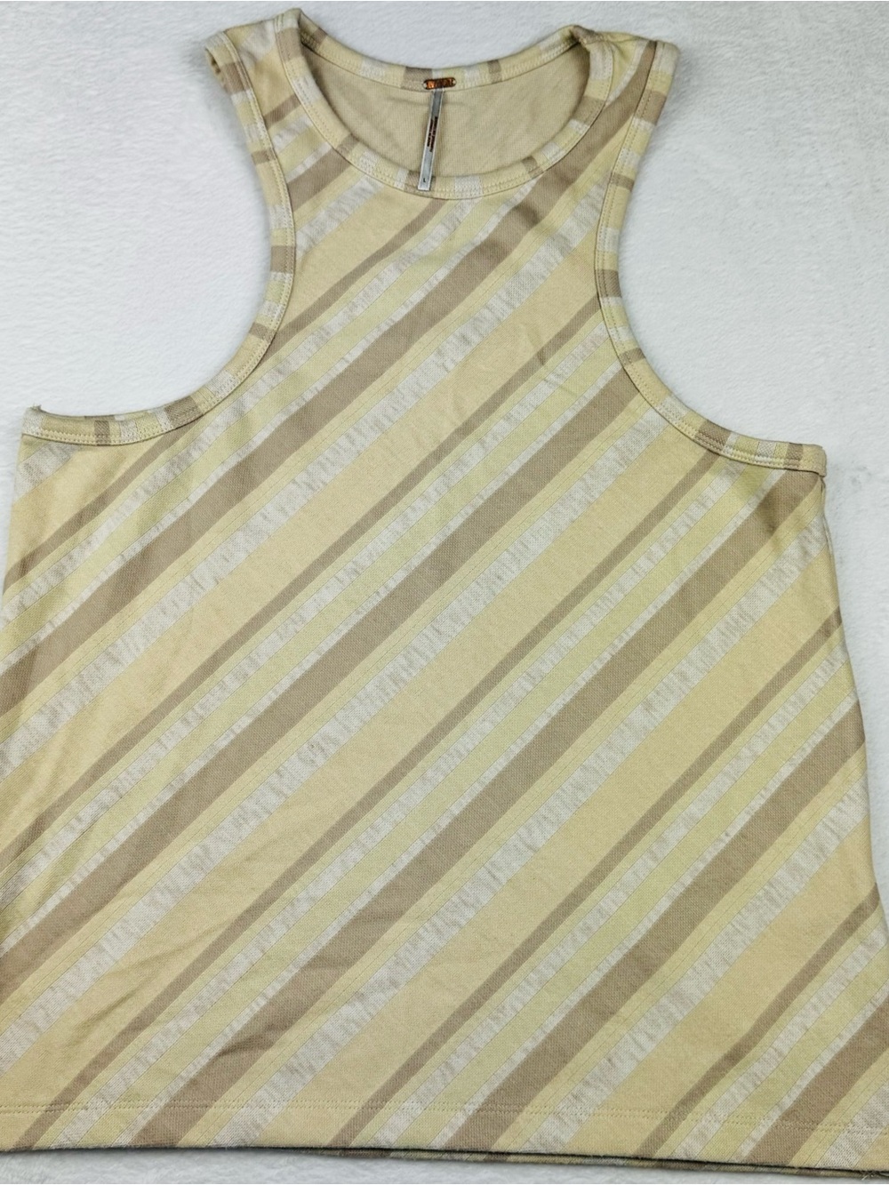 Free People beige striped racerback tank top. Size L.